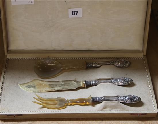 Cased horn & French silver servers